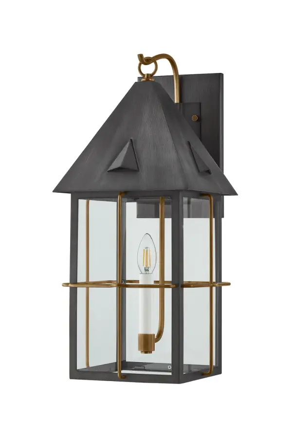 This heritage-inspired sconce beautifully updates the traditional post lantern with contemporary finishes. The warm Patina Brass accents against Graphite framing create visual interest while maintaining coastal authenticity.