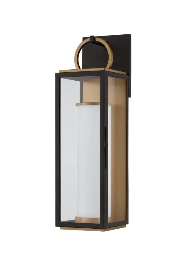 The Gareth LED Wall Sconce reimagines traditional lantern design with a sleek contemporary aesthetic. Its elongated silhouette and mixed Patina Brass and Textured Black finish create visual interest while the integrated LED technology provides efficient, warm illumination.