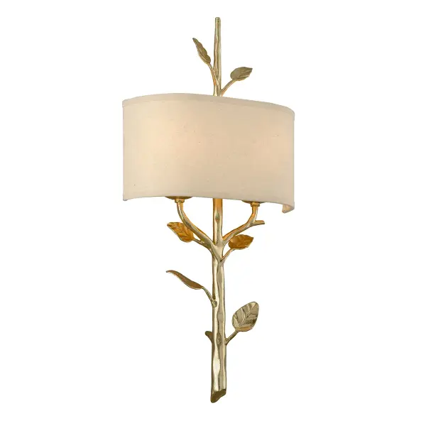 The Almont wall sconce brings organic warmth with its faux bois hand-forged iron arms and gold leaf finish. The hardback linen shade softens the light while the artisanal metalwork adds sculptural interest to any wall.