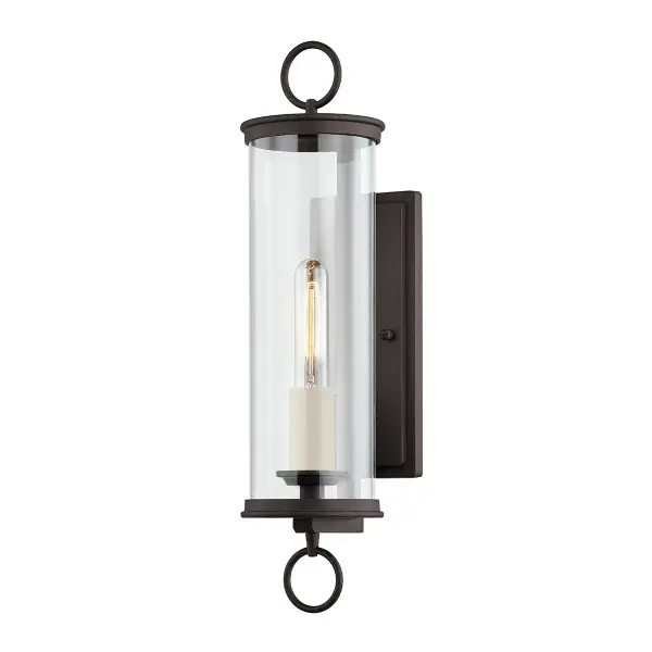 The Aiden wall sconce combines clean lines with hand-crafted aluminum construction and a textured bronze finish. Its wet-rated design and clear glass shade make it ideal for exposed outdoor locations.