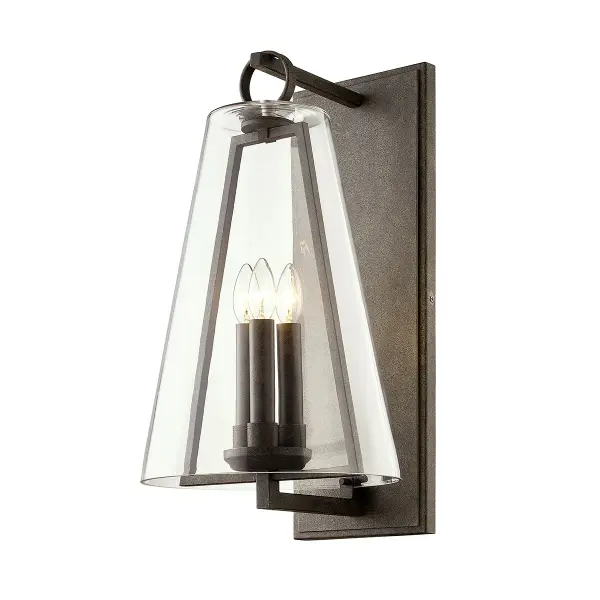 The Adamson wall sconce combines traditional design with outdoor durability. Hand-crafted aluminum construction in French Iron finish with clear glass shades creates timeless appeal for both residential and commercial applications.
