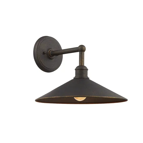 The Shelton wall sconce combines traditional styling with hand-crafted aluminum construction and a vintage bronze finish. Wet-rated for exposed outdoor locations, it delivers reliable illumination for entryways and patios.