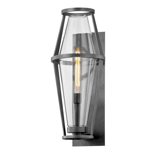 The Prospect wall sconce combines industrial-inspired design with weather-resistant construction. Hand-crafted aluminum in graphite finish pairs with clear glass for a modern aesthetic that works in both residential and commercial settings.