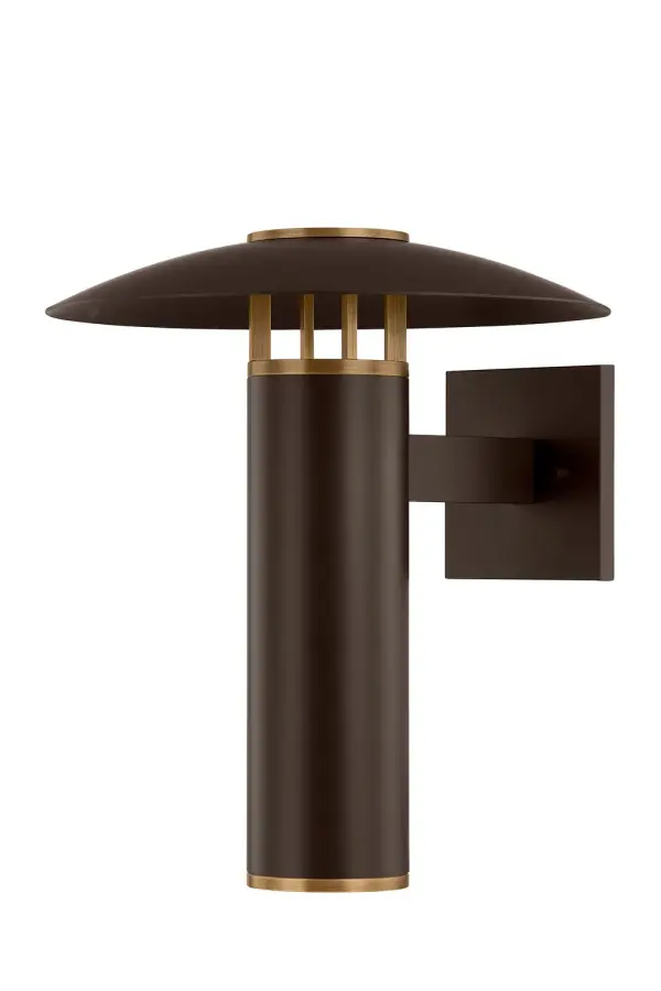 The Birk wall sconce blends sleek architectural design with a classic RLM shade, creating a versatile exterior lighting solution. Its wet-rated aluminum construction and downward LED light make it both durable and functional.