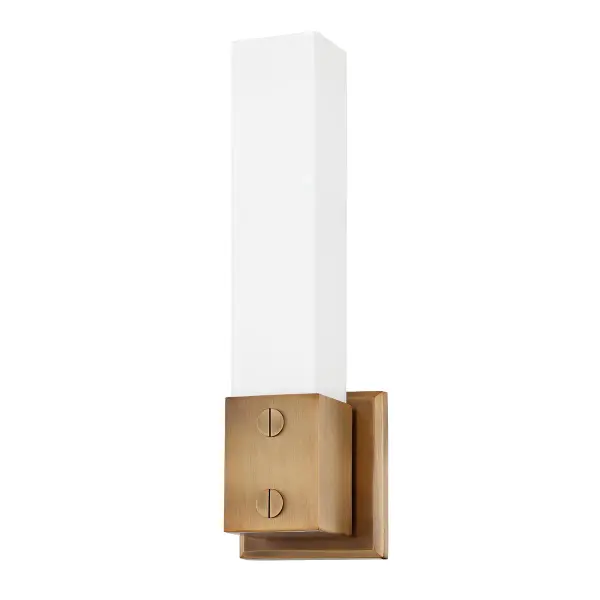 The Jonah sconce masterfully blends industrial aesthetics with refined elegance. Its clean lines and defined shape are beautifully softened by acid-etched opal glass and distinctive jewelry-inspired hardware.