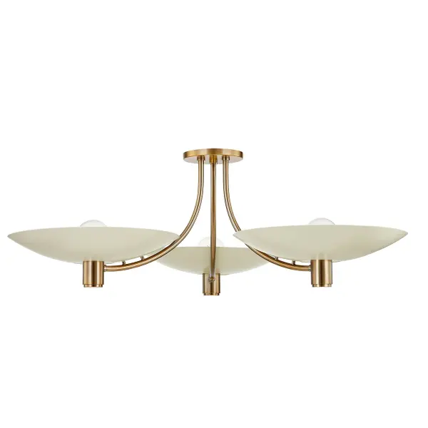 The Wolfe semi-flush mount reimagines mid-century design with graceful curved arms in warm Patina Brass and soft sand glass discs. At over 40 inches wide, it makes a bold statement while providing serene, even illumination.