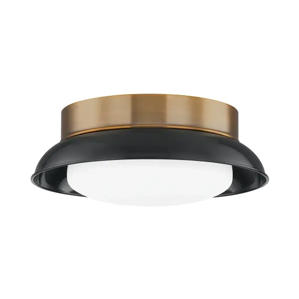 The Arnie flush mount combines modern simplicity with farmhouse warmth through its patina brass canopy, glossy black shade, and opal diffuser. At just 5.25" tall, it's ideal for low ceilings while providing soft, diffused light.