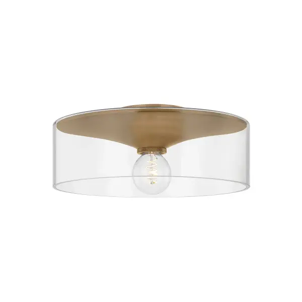 The Killian flush mount combines imaginative design with practical function. Its unique layered construction—a metal funnel encased in cylindrical glass with an exposed bulb—creates visual interest while maintaining a low 6.5-inch profile. The Patina Brass finish adds warmth to contemporary and transitional spaces.
