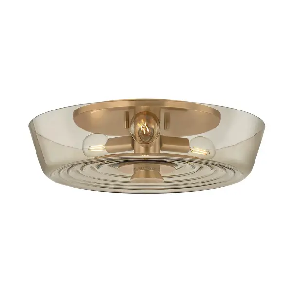 Theodore transforms the utilitarian flush mount into an artistic statement with concentric light bronze glass rings radiating from a warm Patina Brass center. The ripple-effect design adds visual interest to low-ceiling spaces.