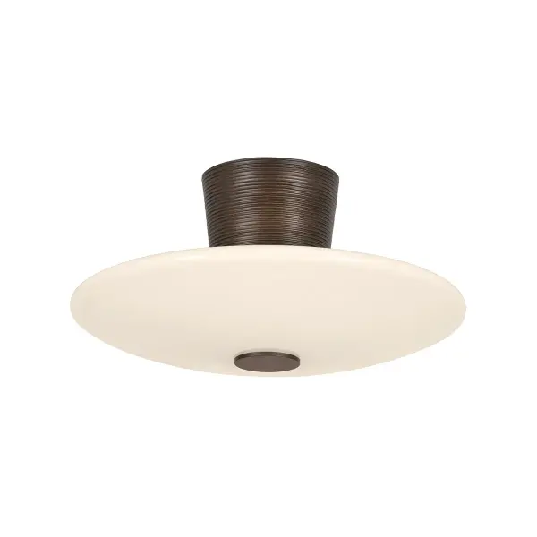 The Albus combines clean geometric lines with textural ribbing detail in a compact semi-flush design. Its integrated LED provides warm, glare-free illumination through a glossy opal shade, while the Bronze Leaf finish adds refined contrast.