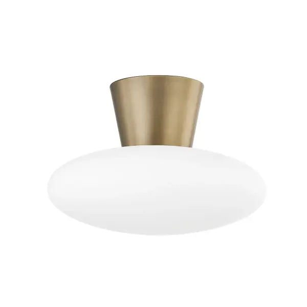 The Brody flush mount elevates standard ceiling lighting with its sophisticated tapered collar design and smooth opal glass shade. Larger than typical flush mounts at 15 inches wide, it makes a statement without overwhelming smaller spaces.