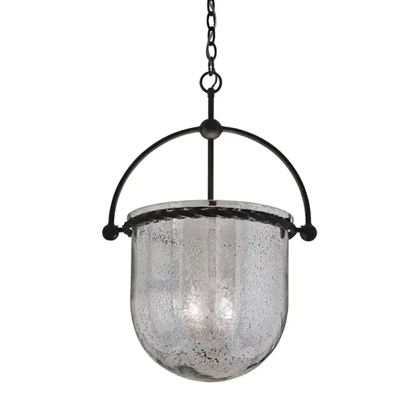 The Mercury lantern combines industrial metal framework with sophisticated swirl glass that creates a soft, linen-like glow. Its balanced square-and-circle design works beautifully in both traditional and contemporary spaces.