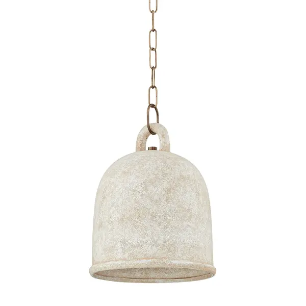 The Relic pendant from Lauren Liess combines earthy texture with refined design. Its white ceramic bell shade features a highly textured surface that creates visual interest while diffusing warm light beautifully.