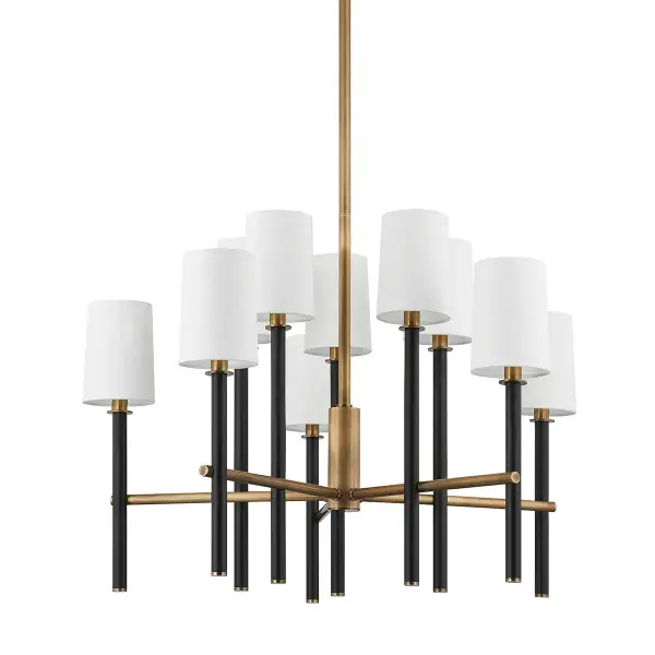 The Belvedere chandelier masterfully blends traditional elegance with modern detailing through its innovative candlestick mounting system. The two-tone Patina Brass and Texture Black finish creates visual depth and sophistication.