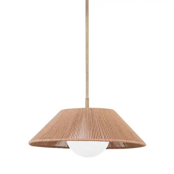 The Lisbon pendant combines natural materials with thoughtful design. Its cotton string shade wraps around an opal glass globe, creating a warm, airy glow when lit. The patina brass finish adds warmth and complements coastal, organic, and Scandinavian interiors.