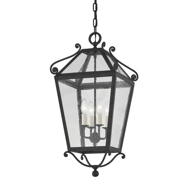 Designer Mark D. Sikes brings coastal California glamour outdoors with this dramatic four-light lantern. Decorative scrollwork and clear glass panels deliver authentic Spanish colonial style with modern wet-rated durability.