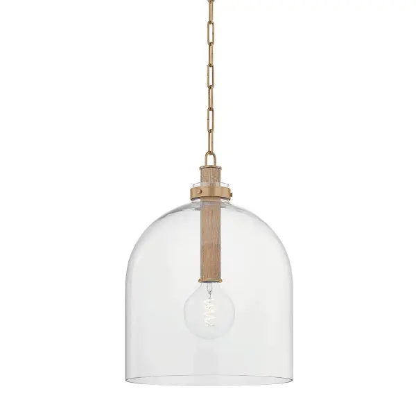 The Kori pendant masterfully blends Japanese minimalism with industrial accents. Its clear glass cloche shade and grasscloth-wrapped center tube create visual interest while maintaining clean lines. Perfect for modern spaces seeking understated elegance.