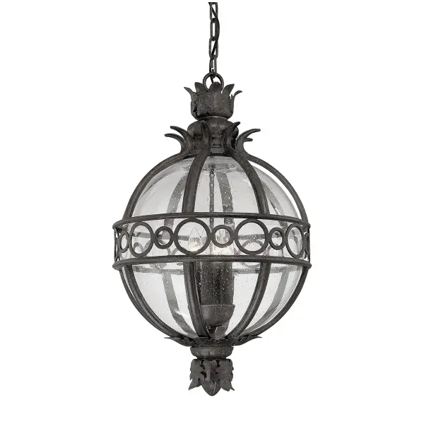 The Campanile lantern brings Old World charm to outdoor spaces with hand-crafted iron and aluminum construction. Its French Iron finish and clear glass panels create warm, inviting illumination perfect for covered porches and entryways.