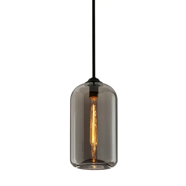 The District pendant brings authentic industrial style with a refined twist. Hand-blown smoke glass and soft black iron create a sophisticated look that works in both traditional and contemporary spaces.