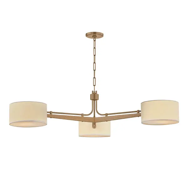 The Mailo chandelier blends modern design with vintage furniture-inspired woodworking. White oak arms with exposed hardware and Patina Brass accents create a sophisticated look, while white linen shades soften the aesthetic. Perfect for contemporary spaces seeking warmth.
