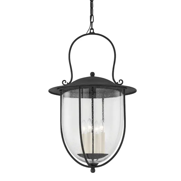The Monterey County pendant by Mark D. Sikes brings coastal elegance to outdoor spaces with its French Iron finish and clear seeded glass. Wet-rated for durability, this four-light fixture balances traditional craftsmanship with weather-resistant performance.