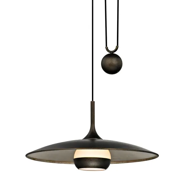 The Alchemy pendant combines hand-worked iron craftsmanship with a warm vintage bronze finish and opal glass shade. Its 24-inch square profile makes a bold statement while remaining versatile enough for various spaces.
