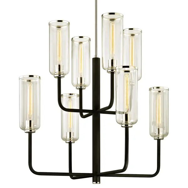 The Aeon chandelier commands attention with its dramatic 37-inch scale and hand-worked iron construction. Eight lights provide substantial illumination while the textured black finish adds depth and character to modern interiors.