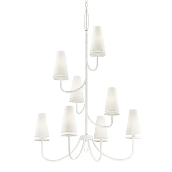 The Marcel chandelier brings architectural drama with hand-worked iron construction and soft white cotton shades. Its 36-inch width and 8-light configuration create substantial presence while the gesso white finish maintains an airy, refined aesthetic.