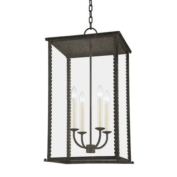 The Zuma outdoor lantern brings organic elegance to exterior spaces with its candelabra-style cage design and climbing leaf motifs. Clear glass panels showcase four candlestick lights while French iron finish adds timeless appeal.