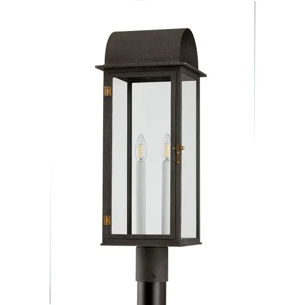 The Bohen post mount reimagines early American gas lanterns with clean lines and rustic elegance. Its French Iron finish with Patina Brass accents delivers timeless curb appeal for traditional homes.