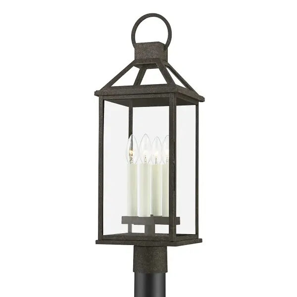 Designed by Becki Owens, this charming post mount lantern brings cottage elegance to outdoor spaces. Clear glass panels and French Iron finish create an airy, sophisticated look that works beautifully in coastal and farmhouse settings.