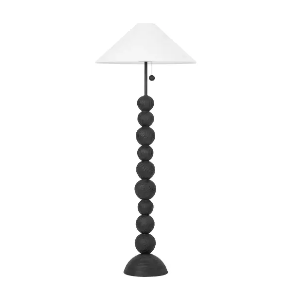 The Miela floor lamp brings artistic presence with its totem-style design featuring hand-crafted Black Motif Ceramic spheres. The oversized pull chain and forged iron frame create industrial contrast against the clean off-white linen shade.