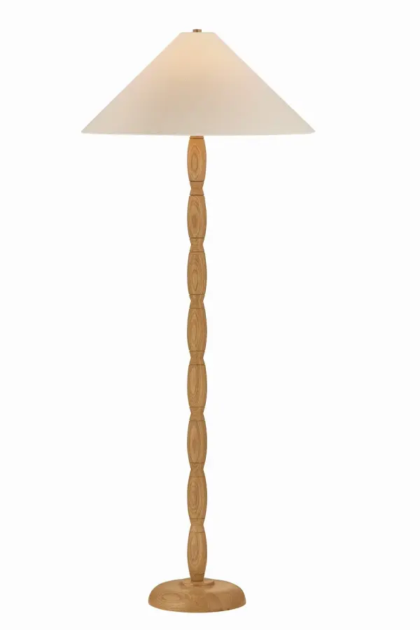 The Parrish floor lamp brings vintage bobbin furniture character to modern spaces with its solid oak base featuring rhythmic curves that showcase natural wood grain. Patina brass accents and a wheat linen shade create warm, diffused lighting perfect for reading nooks and living areas.