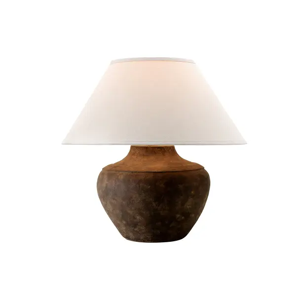 The Calabria table lamp brings Mediterranean warmth with its textural ceramic base and earthy Rustco finish. The large conical linen shade softens light beautifully while the curvy silhouette adds sculptural interest to any room.