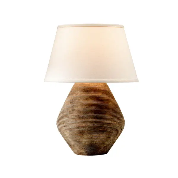 The Calabria table lamp brings sun-soaked Mediterranean style with its textural ceramic base and earthy Reggio finish. The large conical linen shade softens light beautifully while the curvy silhouette adds organic warmth to any space.