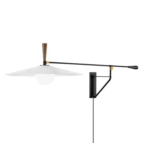 The Duarte wall sconce combines functionality with sophisticated design through its extended 66.5-inch reach and blend of patina brass, soft black steel, and natural acacia wood accents. The off-white linen shade provides soft, diffused light.