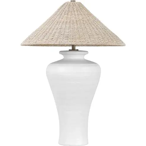 The Pezante table lamp combines heritage-inspired design with modern simplicity. Its ceramic urn-shaped base and bleached Abaca shade create a sophisticated coastal aesthetic perfect for refined interiors.