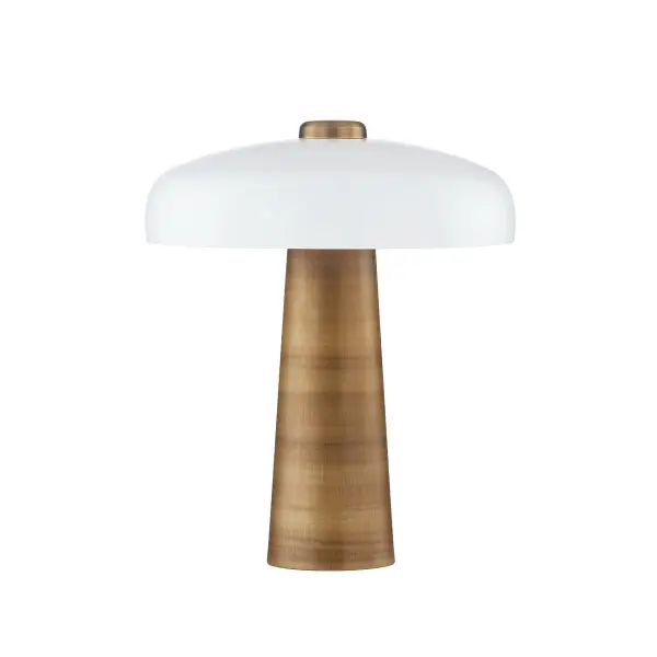 The Lush table lamp elevates the popular mushroom silhouette with sophisticated materials. Its opal glossy glass shade paired with a patina brass stem creates a warm, contemporary aesthetic that works across multiple design styles.