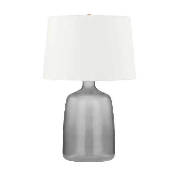 The Artesia table lamp marries vintage vessel-inspired form with contemporary smoked glass and patina brass accents. Its neutral palette and organic silhouette make it a versatile accent piece that elevates any space with understated elegance.