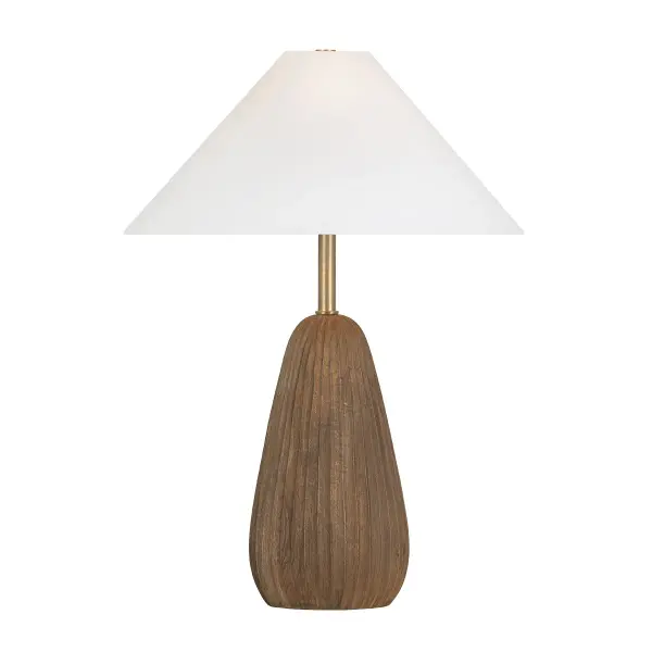 Heartwood brings authentic artisanal charm with its hand-carved wood base featuring rustic grooves and warm staining. The Patina Brass neck adds refined polish while the ivory linen shade softens the sculptural silhouette. Each piece is unique due to natural wood variations.
