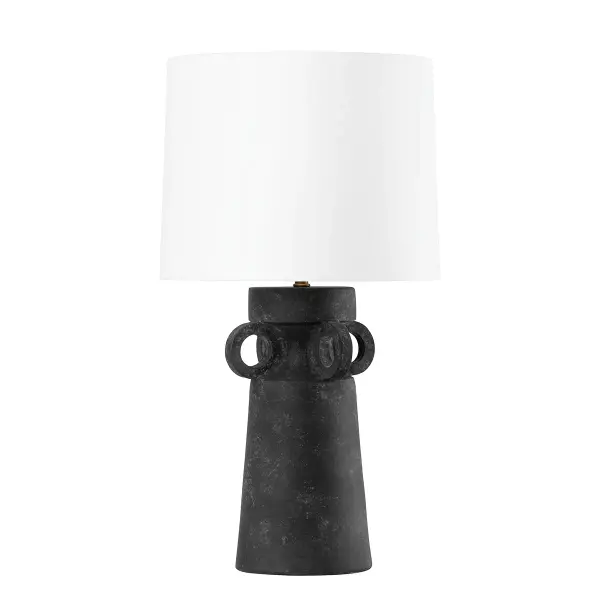 The Santa Cruz table lamp combines ancient-inspired ceramic craftsmanship with modern sensibility. Its artifact black sculptural base creates visual drama while the white linen shade softens the look with warmth and texture.