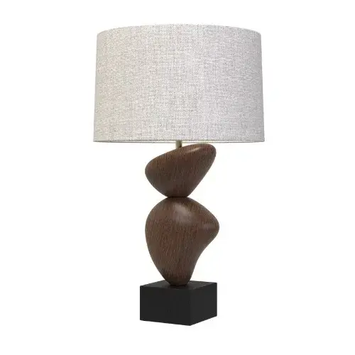 The Lenark table lamp transforms ancient Scottish cairn inspiration into a striking modern accent piece. Its asymmetrical stacked wood forms create visual drama while the bronze accents and natural linen shade add warmth and sophistication.