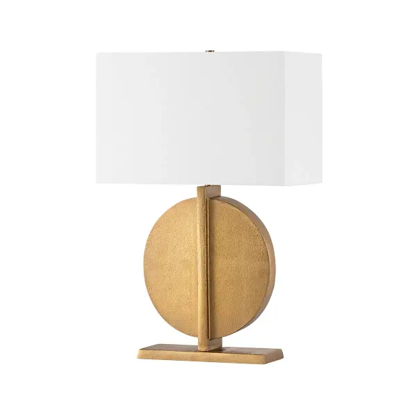 The Colma table lamp combines geometric design with warm patina brass and a crisp white linen shade. Its sculptural base adds visual interest while the neutral shade ensures versatility across modern interiors.