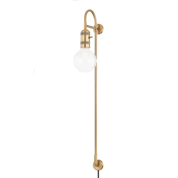 The Dean wall sconce combines soft industrial design with practical plug-in convenience. Its swooping lines and visible mechanical details in patina brass create an elevated yet accessible aesthetic that works across multiple design styles.