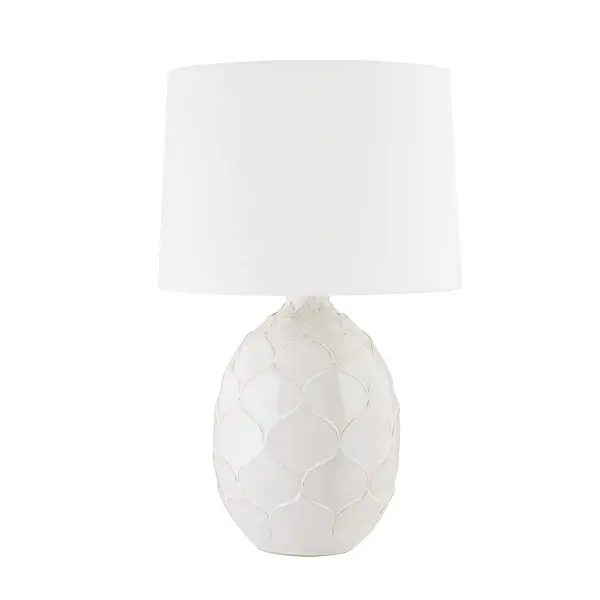 The Gardena table lamp brings organic elegance with its ceramic reactive white glaze base featuring symmetrical dragon fruit-inspired textures. The natural edging and white linen shade create a fresh, elevated look perfect for modern coastal and contemporary interiors.