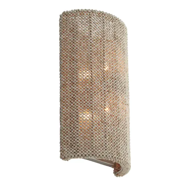 The Copra wall sconce brings organic coastal charm with its hand-woven coco bead shade and brushed nickel finish. Perfect for creating a relaxed, textured look in bathrooms, bedrooms, or hallways with its warm, filtered light.