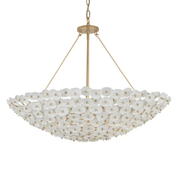 The Coastlyn 36" pendant combines modern sophistication with coastal charm through its generous scale, warm Legacy Brass finish, and distinctive ceramic shades. Eight lights provide ample illumination for large spaces.