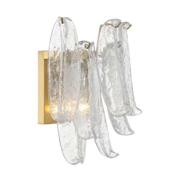 The Regent wall sconce combines warm Legacy Brass finish with unique clear crackled glass shades for sophisticated ambient lighting. Its compact 13-inch profile makes it ideal for bathrooms, hallways, and intimate spaces.