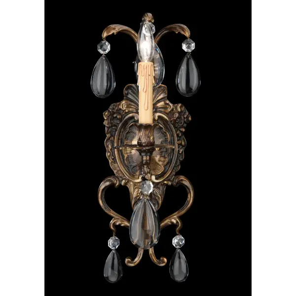 This handcrafted Italian wall sconce combines traditional design with luxurious clear crystals and an antique bronze patina finish. Perfect for adding sophisticated ambient lighting to intimate spaces. - alternate view