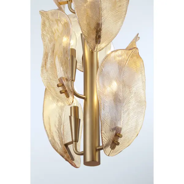The Orchid pendant combines warm Legacy Brass finish with artisanal amber glass shades, creating a sophisticated focal point. Its 10-light configuration provides ample illumination while the handmade glass adds organic character. - alternate view